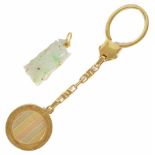 A Continental contemporary circular fob key ring, the fob with central multicoloured gold striped