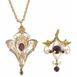 An Art Noveau amethyst and pearl scroll drop pendant stamped 9ct on 15ct gold chain and another