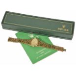 A 9ct gold Rolex ladies bracelet watch, circa 1980 the oval dial with baton markers and with