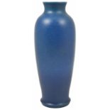 A Pilkingtons Royal Lancastrian vase of elongated ovoid form decorated in a mottled blue design