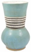 Abigail Ozora Simpson a large pottery vase, of aqua colouring with horizontal banding to the centre,