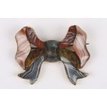 A Victorian Scottish agate brooch in the form of a bow on gold coloured metal mount width 4.