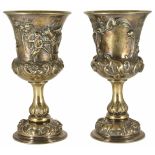 A pair of Victorian silver gilt embossed and repoussé goblets hallmarked London 1858, decorated with