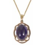 A contemporary 9t gold mounted oval amethyst crystal geode set pendant on gold chain, together