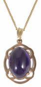 A contemporary 9t gold mounted oval amethyst crystal geode set pendant on gold chain, together