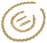 A suite of 18ct gold Continental jewellery comprising of necklace, bracelet and earrings of matching