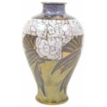 A Doulton stoneware vase of baluster form decorated with stylised flowers and leaves, artist mark LB