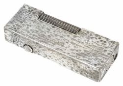 A Dunhill silver plated rectangular lighter with overall textured finish, wheel action and flip