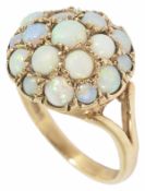 A 9ct gold opal mounted bombe dress ring, circa 1970 Size MCondition: One stone pushed into mount