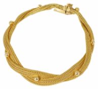 A Continental yellow metal bracelet of mesh strap and ball decorated twist design, push clasp