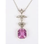 A delicate Edwardian pink sapphire and diamond necklace, the rectangular cut cornered sapphire