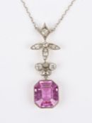 A delicate Edwardian pink sapphire and diamond necklace, the rectangular cut cornered sapphire