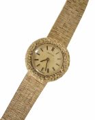 A ladies 'Certina' 9ct gold wind up bracelet watch, the circular dial with baton markers and soft