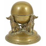 An usual novelty brass late 19th/early 20th century inkwell with three cast seated dogs looking