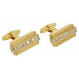 A pair of Continental 18ct two colour gold and diamond set cufflinks of rectangular stepped Art Deco