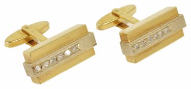 A pair of Continental 18ct two colour gold and diamond set cufflinks of rectangular stepped Art Deco