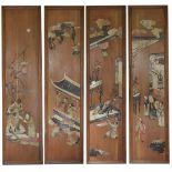 A set of four Chinese carved soapstone inlaid wooden panels, circa 1920, each panel depicting