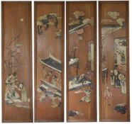 A set of four Chinese carved soapstone inlaid wooden panels, circa 1920, each panel depicting