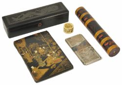 A Japanese lacquer and gilt book cover decorated with a geisha scene