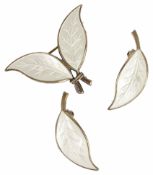 A David Anderson, Norwegian sterling silver and white enamel brooch and matching earrings, the