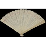 A large early 20th century Chinese Canton carved ivory fan finely carved and pierced on both sides