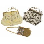 Two small evening bags and a coin purse one evening bag possibly silk with embroidery and some