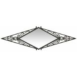 An Art Deco style overmantle metal mirror of pierced form width 105cmCondition: In good condition