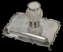A lady's silver presentation inkwell and pen stand hallmarked Sheffield 1918, with central inkwell