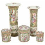 A small collection of famille rose, comprising of two cylinder shaped vases and three graduated