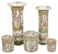 A small collection of famille rose, comprising of two cylinder shaped vases and three graduated