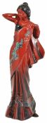 A Royal Doulton flambé figure of a lady, Eastern Grace dated 1996, decorated with mottled effect.