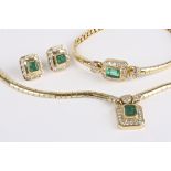 A Continental emerald and diamond suite of jewellery comprising of a yellow gold mounted emerald and
