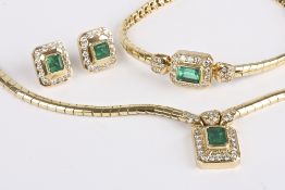 A Continental emerald and diamond suite of jewellery comprising of a yellow gold mounted emerald and