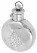 A Victorian silver hip flask hallmarked Chester 1898, of circular form with twist hinged lid, centre