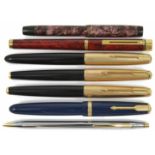 A collection of fountain pens and others to include a Sheaffer, three Parker, a Parker Duofold, a