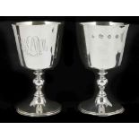A pair of silver goblets hallmarked London 1967, both with intertwined owners initials approximate
