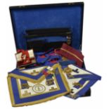 A collection of Masonic Regalia Including Grand chapter aprons and collars and an assortment of
