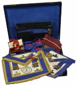 A collection of Masonic Regalia Including Grand chapter aprons and collars and an assortment of