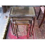 REPRODUCTION MAHOGANY GLASS TOPPED NEST OF THREE TABLES