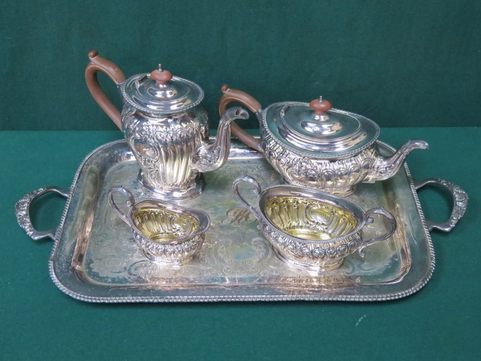 SILVER PLATED FOUR PIECE TEA SET ON TWO HANDLED TRAY