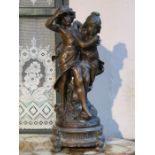 VICTORIAN BRONZE EFFECT FIGURE GROUP OF A BOY AND GIRL ON CAST METALS STAND,