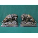 PAIR OF REPRODUCTION BRONZE EFFECT LIONS ON MARBLE SUPPORTS