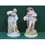 PAIR OF CONTINENTAL STYLE HANDPAINTED AND GILDED UNGLAZED BISQUE STYLE FIGURES,