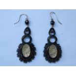 PAIR OF CARVED BAKELITE/JET VICTORIAN STYLE DROP EARRINGS WITH GOLD COLOURED DECORATION