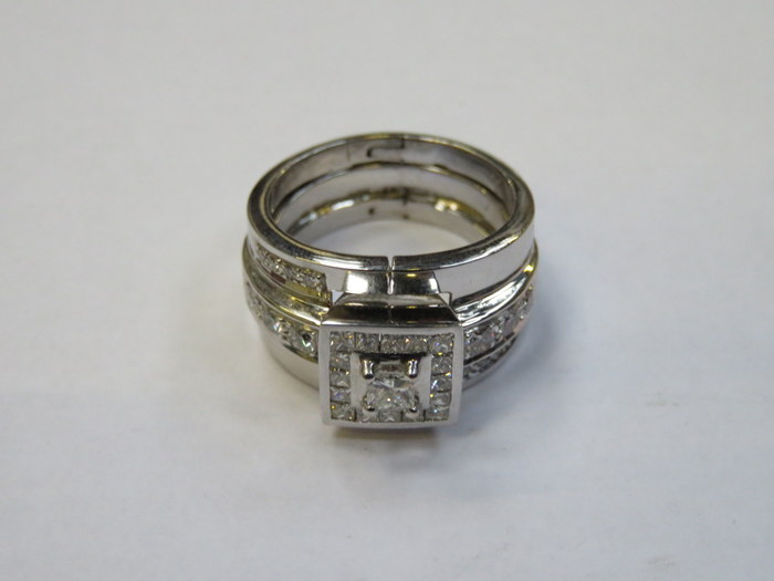 18ct WHITE GOLD SQUARE SHAPED DIAMOND CLUSTER RING WITH DIAMOND SET SHOULDERS AND A HINGED