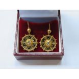 PAIR OF UNHALLMARKED VICTORIAN STYLE PIERCEWORK DROP EARRINGS SET WITH CENTRAL CLEAR STONE