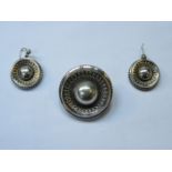 VICTORIAN STYLE UNHALLMARKED SILVER COLOURED CIRCULAR BROOCH AND MATCHING EARRINGS