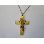 9ct GOLD CROSS SET WITH THREE RUBY COLOURED STONES ON 9ct GOLD CHAIN