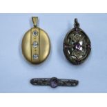 TWO DECORATIVE OVAL LOCKETS AND STERLING SILVER BROOCH