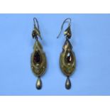 PAIR OF UNHALLMARKED VICTORIAN GOLD COLOURED DROP EARRINGS SET WITH PURPLE STONES